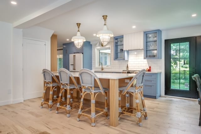 Shiplap and open shelving frame the dining nook — kitchen renovation by Corey Bowen Construction in Hudson, QC