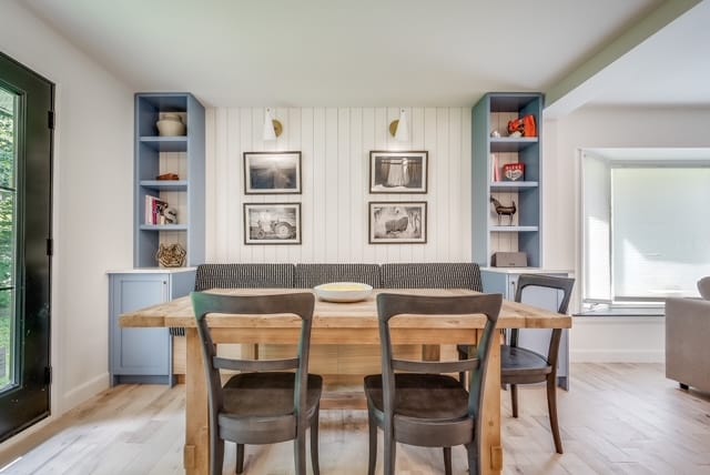 Banquette dining, built in where the family already gathers — kitchen renovation by Corey Bowen Construction in Hudson, QC