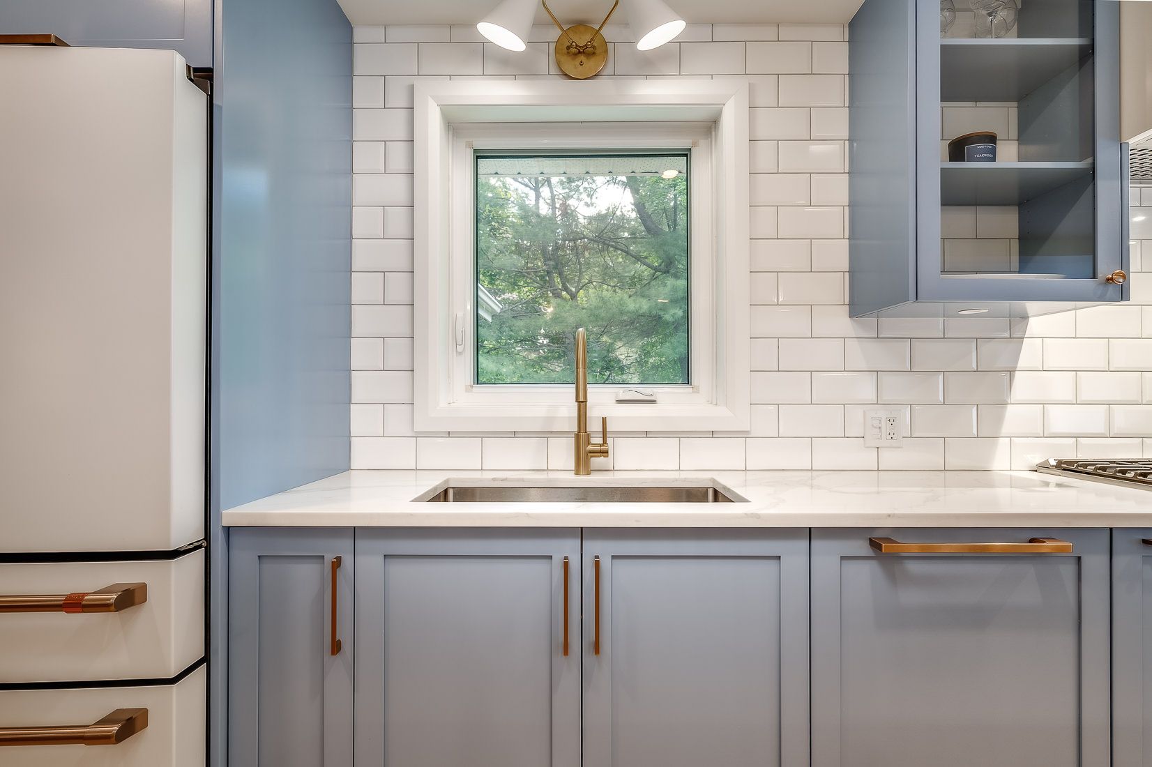 Island storage, drawers and integrated microwave — kitchen renovation by Corey Bowen Construction in Hudson, QC