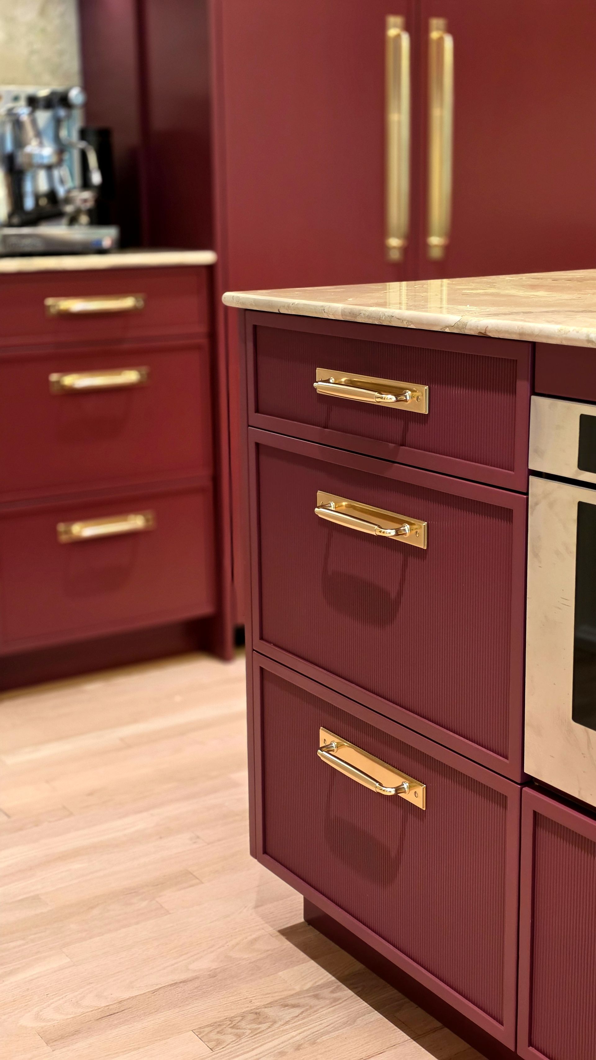 Red kitchen units built to measure, top to bottom — kitchen renovation by Corey Bowen Construction