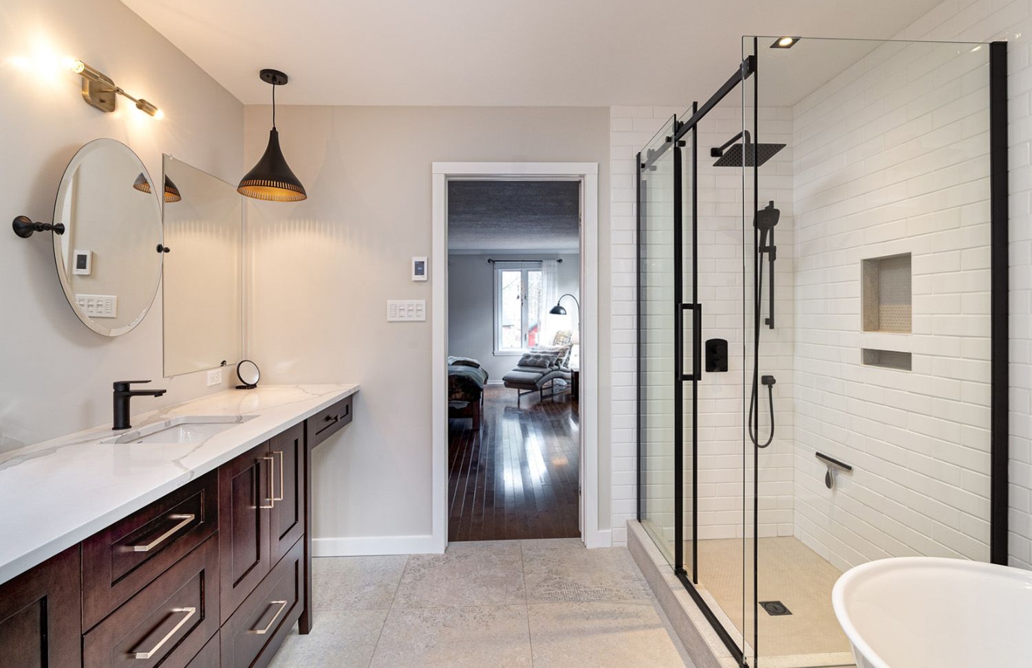 Custom woodwork and tiling in a bathroom renovation by Corey Bowen Construction
