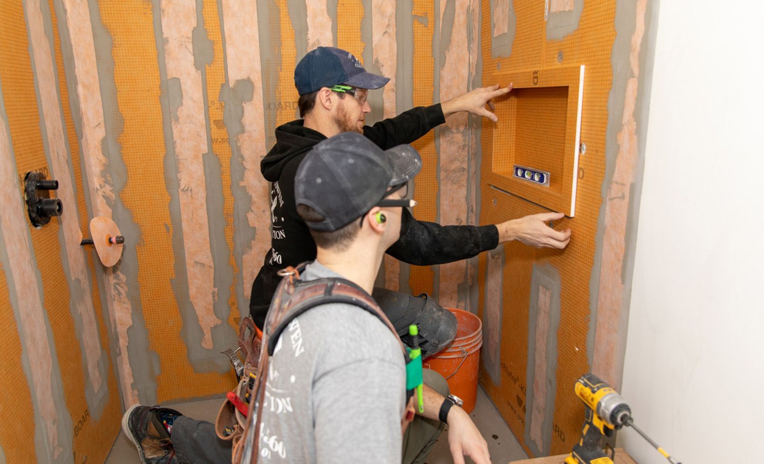 Corey Bowen carrying out carpentry work on a Hudson-area renovation